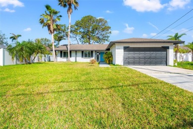 Freshly renovated and ready for a new chapter, 6070 Denver St NE on Mangrove Bay Golf Course in Florida - for sale on GolfHomes.com, golf home, golf lot