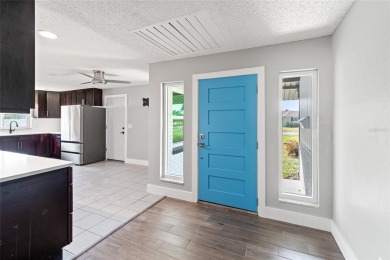 Freshly renovated and ready for a new chapter, 6070 Denver St NE on Mangrove Bay Golf Course in Florida - for sale on GolfHomes.com, golf home, golf lot