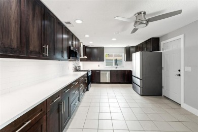 Freshly renovated and ready for a new chapter, 6070 Denver St NE on Mangrove Bay Golf Course in Florida - for sale on GolfHomes.com, golf home, golf lot
