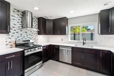 Freshly renovated and ready for a new chapter, 6070 Denver St NE on Mangrove Bay Golf Course in Florida - for sale on GolfHomes.com, golf home, golf lot