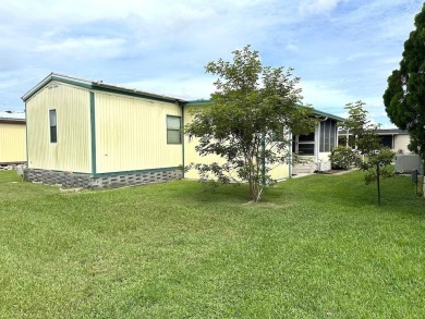 MOTIVATED SELLERS! HOME IS PRICED TO SELL. 2-BEDROOM, 2-BATHROOM on Anglers Green Golf Course in Florida - for sale on GolfHomes.com, golf home, golf lot