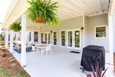 Hampton Golf Village! Stunning 3 sided brick home features the on Hampton Golf Village in Georgia - for sale on GolfHomes.com, golf home, golf lot
