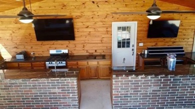Luxurious 6 bedroom, 4.5 bath home on the 5th hole of Riverlinks on Tahlequah City Golf Course in Oklahoma - for sale on GolfHomes.com, golf home, golf lot