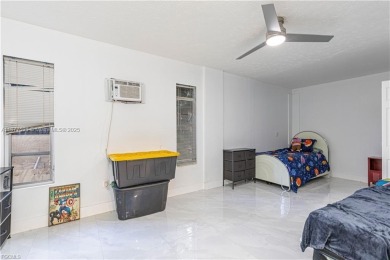 This gorgeous 4 bedroom, 2 bath pool home in the historic Palm on Fort Myers Country Club in Florida - for sale on GolfHomes.com, golf home, golf lot