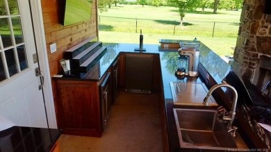 Luxurious 6 bedroom, 4.5 bath home on the 5th hole of Riverlinks on Tahlequah City Golf Course in Oklahoma - for sale on GolfHomes.com, golf home, golf lot