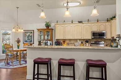 Immaculate 1,822-sq-ft residence perfectly situated within the on Pecan Plantation Country Club in Texas - for sale on GolfHomes.com, golf home, golf lot