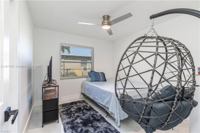 This gorgeous 4 bedroom, 2 bath pool home in the historic Palm on Fort Myers Country Club in Florida - for sale on GolfHomes.com, golf home, golf lot