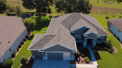 Stunning home loaded with upgrades on a deep semi-private lot on Eagle Ridge At Spruce Creek Country Club in Florida - for sale on GolfHomes.com, golf home, golf lot