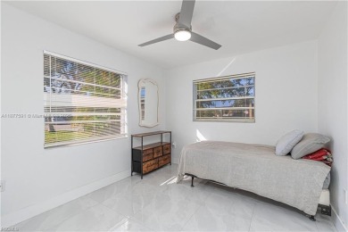 This gorgeous 4 bedroom, 2 bath pool home in the historic Palm on Fort Myers Country Club in Florida - for sale on GolfHomes.com, golf home, golf lot