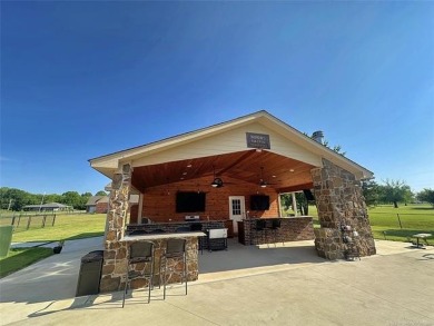 Luxurious 6 bedroom, 4.5 bath home on the 5th hole of Riverlinks on Tahlequah City Golf Course in Oklahoma - for sale on GolfHomes.com, golf home, golf lot