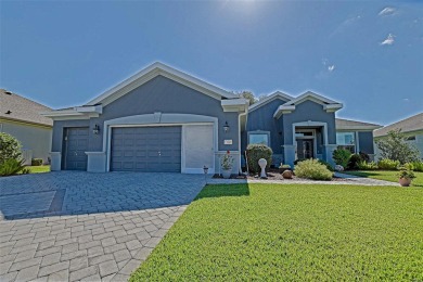 Stunning home loaded with upgrades on a deep semi-private lot on Eagle Ridge At Spruce Creek Country Club in Florida - for sale on GolfHomes.com, golf home, golf lot