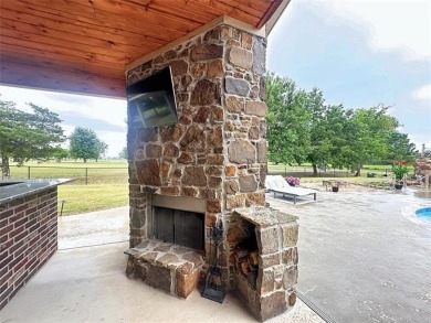 Luxurious 6 bedroom, 4.5 bath home on the 5th hole of Riverlinks on Tahlequah City Golf Course in Oklahoma - for sale on GolfHomes.com, golf home, golf lot