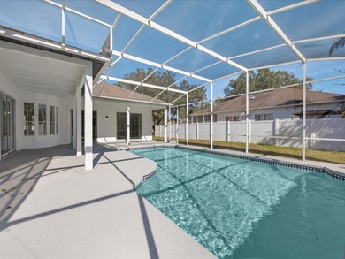 Located in a gated golf course community, 411 Boxwood Dr has on Ridgewood Lakes Golf and Country Club in Florida - for sale on GolfHomes.com, golf home, golf lot