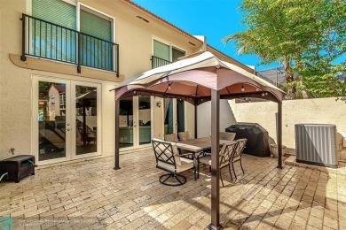 Welcome to Townhomes of Doral Place. Exclusive, gated, only 83 on Jim McLean Signature Course in Florida - for sale on GolfHomes.com, golf home, golf lot
