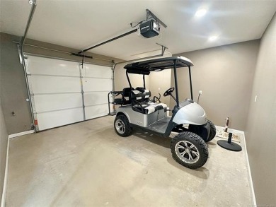 Luxurious 6 bedroom, 4.5 bath home on the 5th hole of Riverlinks on Tahlequah City Golf Course in Oklahoma - for sale on GolfHomes.com, golf home, golf lot
