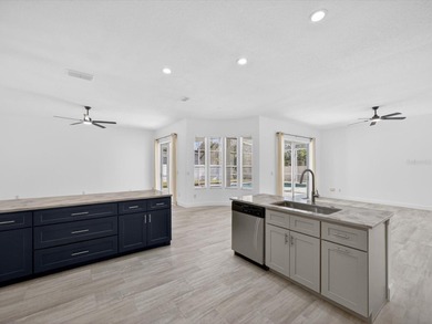 Located in a gated golf course community, 411 Boxwood Dr has on Ridgewood Lakes Golf and Country Club in Florida - for sale on GolfHomes.com, golf home, golf lot