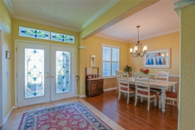 Stunning home loaded with upgrades on a deep semi-private lot on Eagle Ridge At Spruce Creek Country Club in Florida - for sale on GolfHomes.com, golf home, golf lot