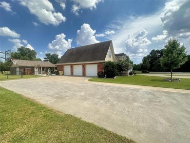 Luxurious 6 bedroom, 4.5 bath home on the 5th hole of Riverlinks on Tahlequah City Golf Course in Oklahoma - for sale on GolfHomes.com, golf home, golf lot