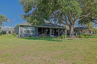 Stunning home loaded with upgrades on a deep semi-private lot on Eagle Ridge At Spruce Creek Country Club in Florida - for sale on GolfHomes.com, golf home, golf lot