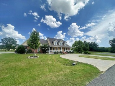 Luxurious 6 bedroom, 4.5 bath home on the 5th hole of Riverlinks on Tahlequah City Golf Course in Oklahoma - for sale on GolfHomes.com, golf home, golf lot