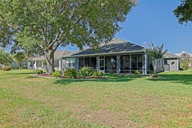 Stunning home loaded with upgrades on a deep semi-private lot on Eagle Ridge At Spruce Creek Country Club in Florida - for sale on GolfHomes.com, golf home, golf lot