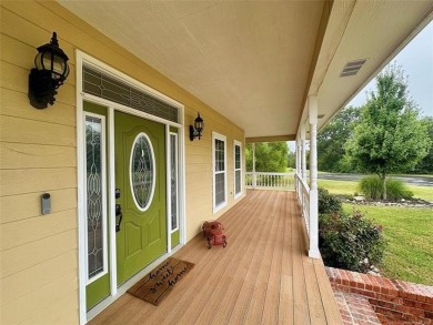 Luxurious 6 bedroom, 4.5 bath home on the 5th hole of Riverlinks on Tahlequah City Golf Course in Oklahoma - for sale on GolfHomes.com, golf home, golf lot