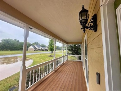 Luxurious 6 bedroom, 4.5 bath home on the 5th hole of Riverlinks on Tahlequah City Golf Course in Oklahoma - for sale on GolfHomes.com, golf home, golf lot