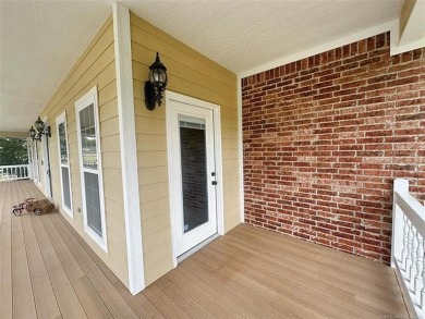 Luxurious 6 bedroom, 4.5 bath home on the 5th hole of Riverlinks on Tahlequah City Golf Course in Oklahoma - for sale on GolfHomes.com, golf home, golf lot