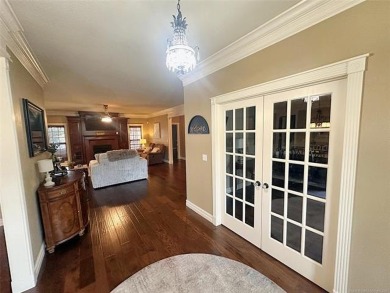 Luxurious 6 bedroom, 4.5 bath home on the 5th hole of Riverlinks on Tahlequah City Golf Course in Oklahoma - for sale on GolfHomes.com, golf home, golf lot