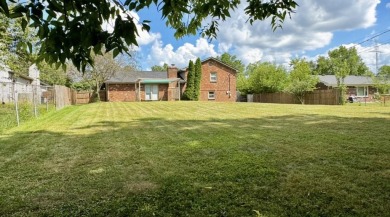 Located on the 12th hole of Tates Creek Golf Course this Updated on Tates Creek Golf Course in Kentucky - for sale on GolfHomes.com, golf home, golf lot