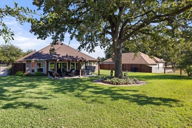 Immaculate 1,822-sq-ft residence perfectly situated within the on Pecan Plantation Country Club in Texas - for sale on GolfHomes.com, golf home, golf lot