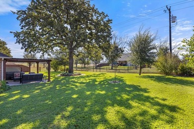 Immaculate 1,822-sq-ft residence perfectly situated within the on Pecan Plantation Country Club in Texas - for sale on GolfHomes.com, golf home, golf lot