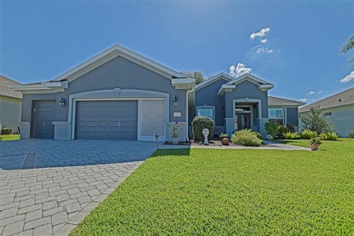 Stunning home loaded with upgrades on a deep semi-private lot on Eagle Ridge At Spruce Creek Country Club in Florida - for sale on GolfHomes.com, golf home, golf lot