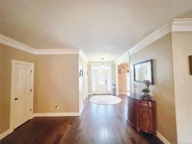 Luxurious 6 bedroom, 4.5 bath home on the 5th hole of Riverlinks on Tahlequah City Golf Course in Oklahoma - for sale on GolfHomes.com, golf home, golf lot