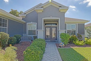 Stunning home loaded with upgrades on a deep semi-private lot on Eagle Ridge At Spruce Creek Country Club in Florida - for sale on GolfHomes.com, golf home, golf lot