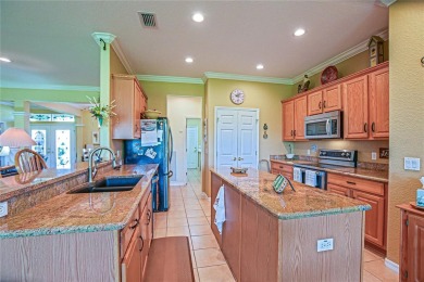 Stunning home loaded with upgrades on a deep semi-private lot on Eagle Ridge At Spruce Creek Country Club in Florida - for sale on GolfHomes.com, golf home, golf lot