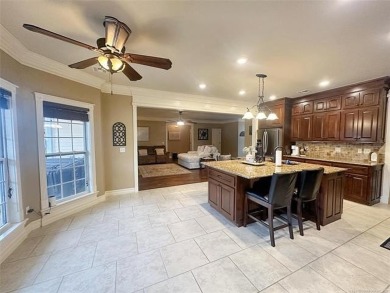 Luxurious 6 bedroom, 4.5 bath home on the 5th hole of Riverlinks on Tahlequah City Golf Course in Oklahoma - for sale on GolfHomes.com, golf home, golf lot