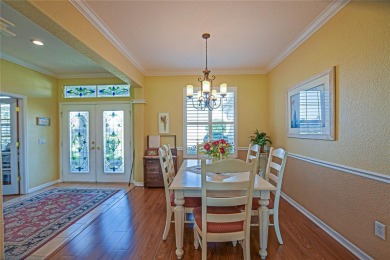 Stunning home loaded with upgrades on a deep semi-private lot on Eagle Ridge At Spruce Creek Country Club in Florida - for sale on GolfHomes.com, golf home, golf lot