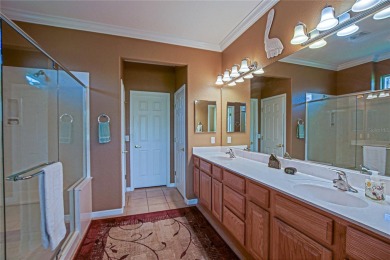 Stunning home loaded with upgrades on a deep semi-private lot on Eagle Ridge At Spruce Creek Country Club in Florida - for sale on GolfHomes.com, golf home, golf lot
