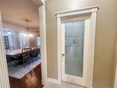 Luxurious 6 bedroom, 4.5 bath home on the 5th hole of Riverlinks on Tahlequah City Golf Course in Oklahoma - for sale on GolfHomes.com, golf home, golf lot