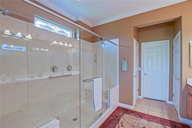 Stunning home loaded with upgrades on a deep semi-private lot on Eagle Ridge At Spruce Creek Country Club in Florida - for sale on GolfHomes.com, golf home, golf lot