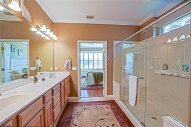 Stunning home loaded with upgrades on a deep semi-private lot on Eagle Ridge At Spruce Creek Country Club in Florida - for sale on GolfHomes.com, golf home, golf lot