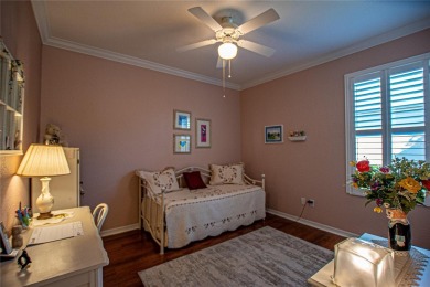 Stunning home loaded with upgrades on a deep semi-private lot on Eagle Ridge At Spruce Creek Country Club in Florida - for sale on GolfHomes.com, golf home, golf lot