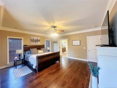 Luxurious 6 bedroom, 4.5 bath home on the 5th hole of Riverlinks on Tahlequah City Golf Course in Oklahoma - for sale on GolfHomes.com, golf home, golf lot