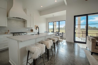 Modern Hill Country Living on Lake LBJ at The Legends Golf on Legends Golf Course in Texas - for sale on GolfHomes.com, golf home, golf lot