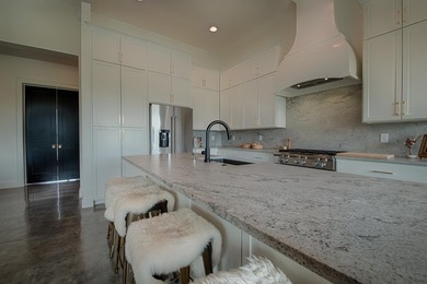 Modern Hill Country Living on Lake LBJ at The Legends Golf on Legends Golf Course in Texas - for sale on GolfHomes.com, golf home, golf lot