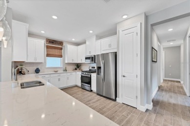 Step into paradise at 3025 Veneto Court, an upgraded on Esplanade Golf and Country at Lakewood Ranch in Florida - for sale on GolfHomes.com, golf home, golf lot