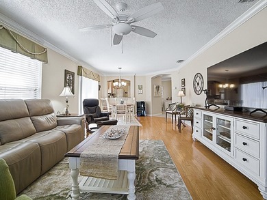 WARM AND WELCOMING this Beauregard villa is nestled in Greenwood on Oakleigh Executive Golf Course in Florida - for sale on GolfHomes.com, golf home, golf lot