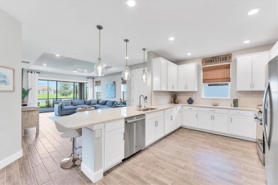 Step into paradise at 3025 Veneto Court, an upgraded on Esplanade Golf and Country at Lakewood Ranch in Florida - for sale on GolfHomes.com, golf home, golf lot