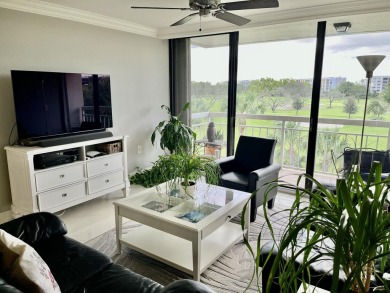 Imagine stepping into a rarely available PENTHOUSE CORNER UNIT on The Country Club At Boca Raton in Florida - for sale on GolfHomes.com, golf home, golf lot